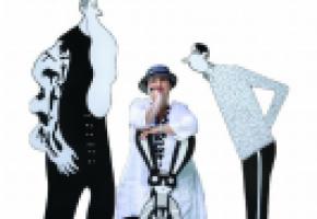 Albertine entourée de ses personnages noirs et blancs fantasques.  MAGALI GIRARDIN/VILLE DE CAROUGE