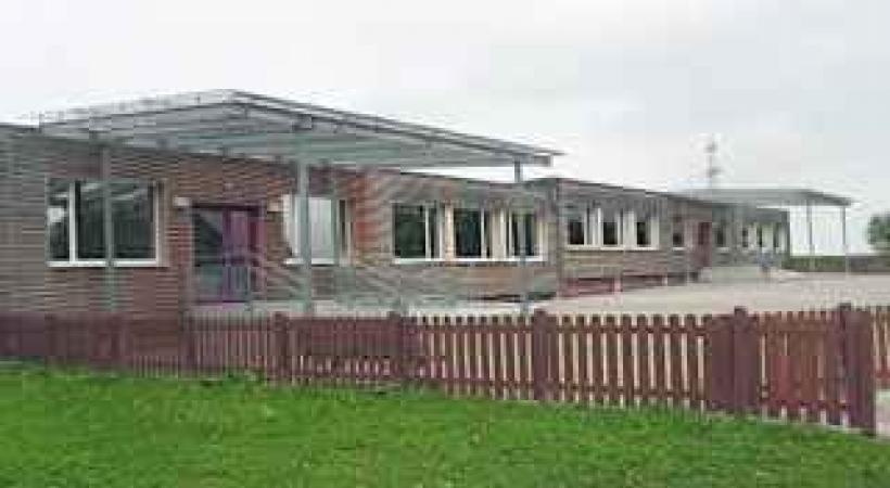 Elève handicapé privé de rampes d'accès